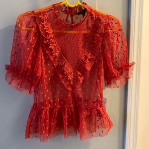 Beautiful red blouse/ see through lace pattern w/ elastic band.